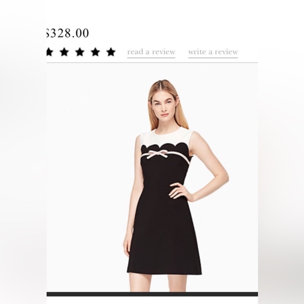 Kate Spade black and white  dress with scalloped detail and light pink bow